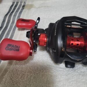Abu Garcia Red and Black Baitcasting Reel - Ready for Angling